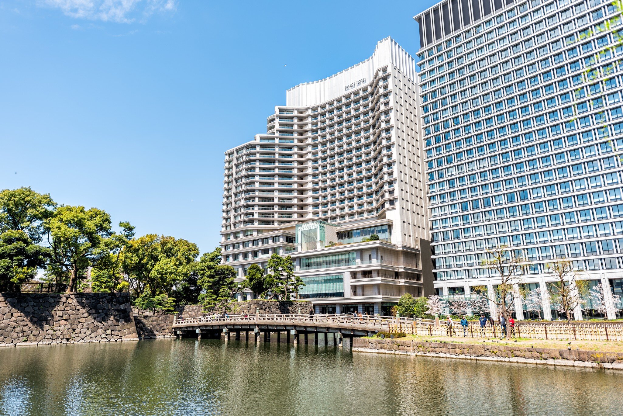Exterior of a large hotel on a waterfront in Tokyo