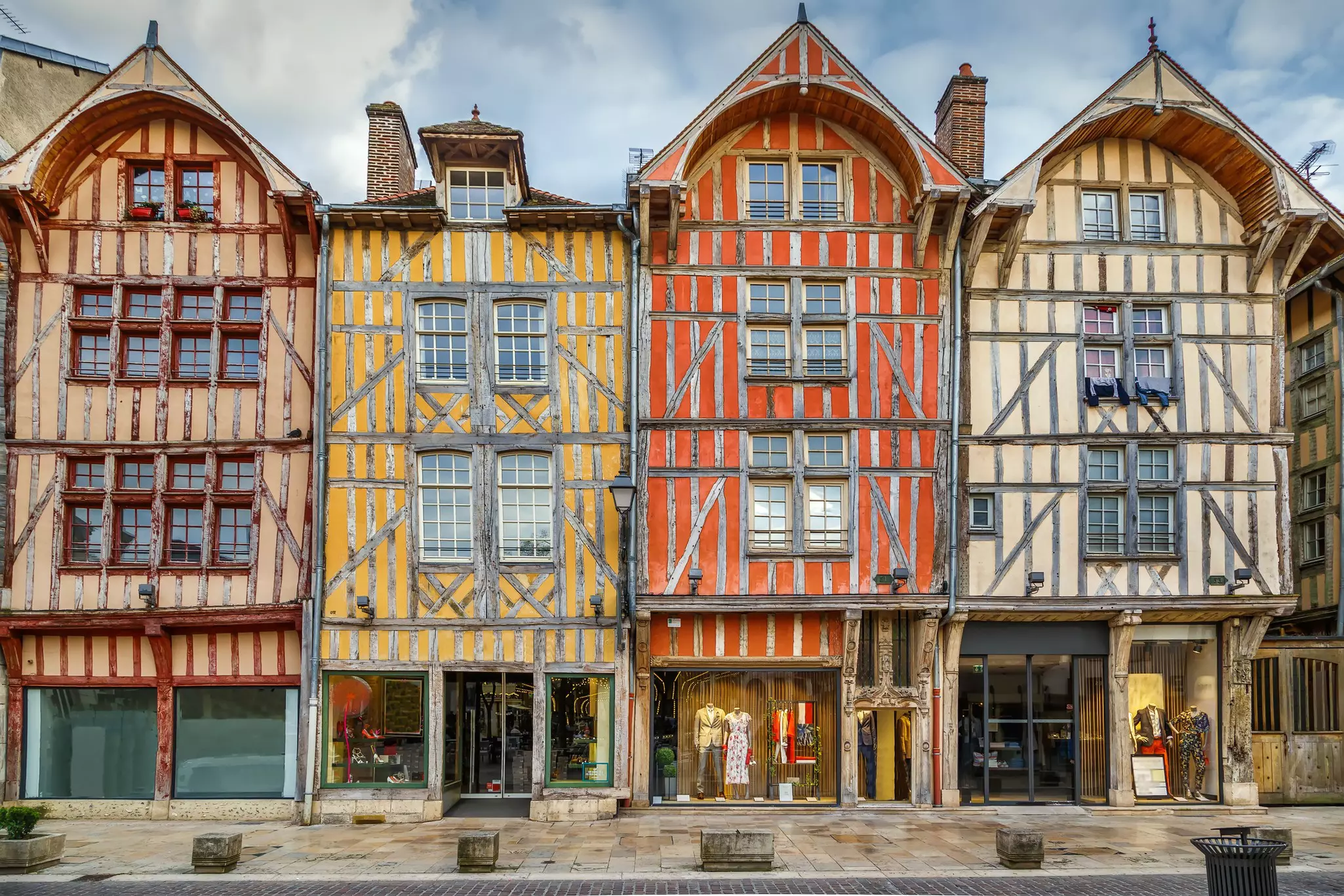 A row of medieval houses with crooked beams and small windows
