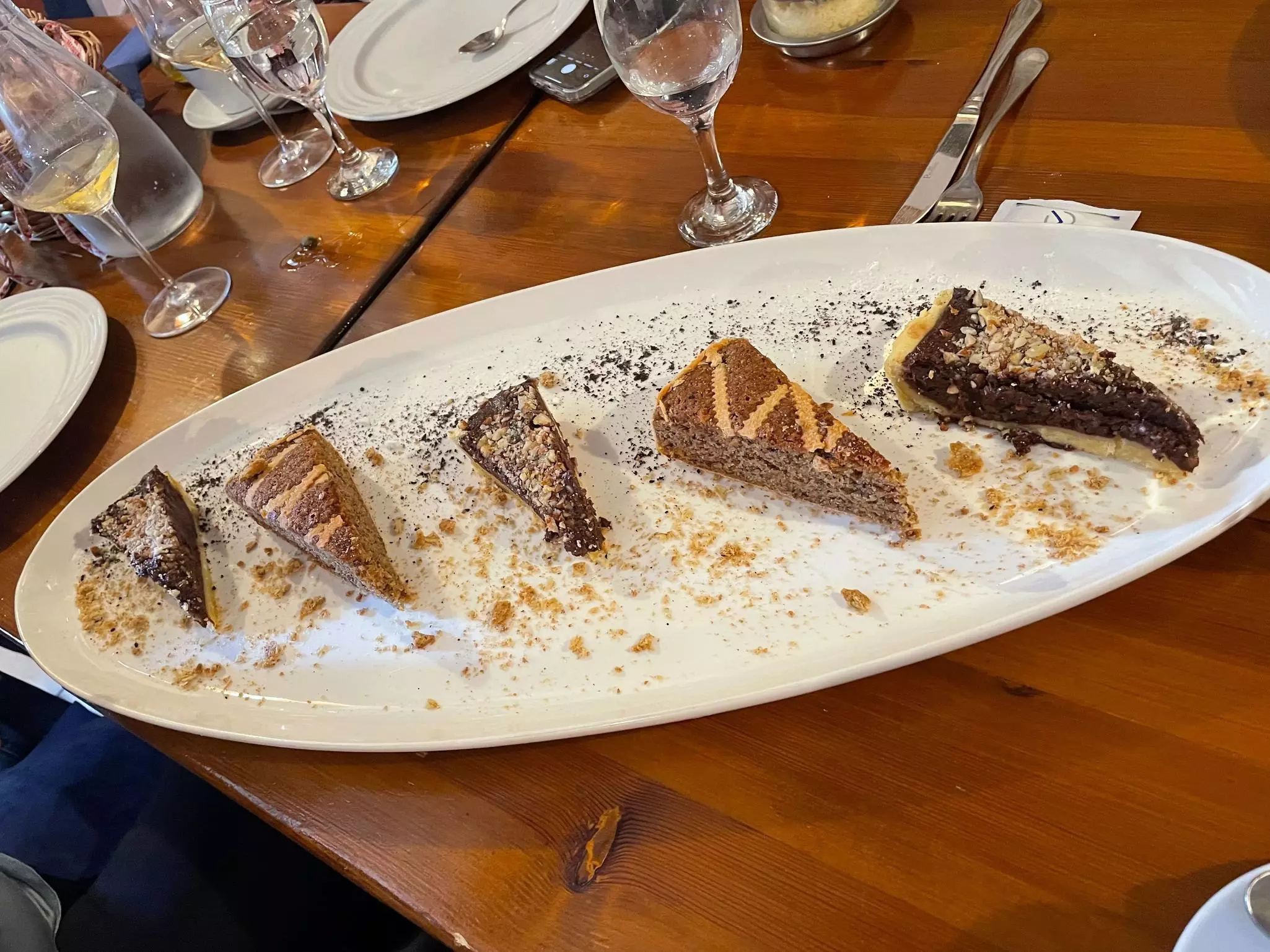 A plate with slices of a nut-based tart on them