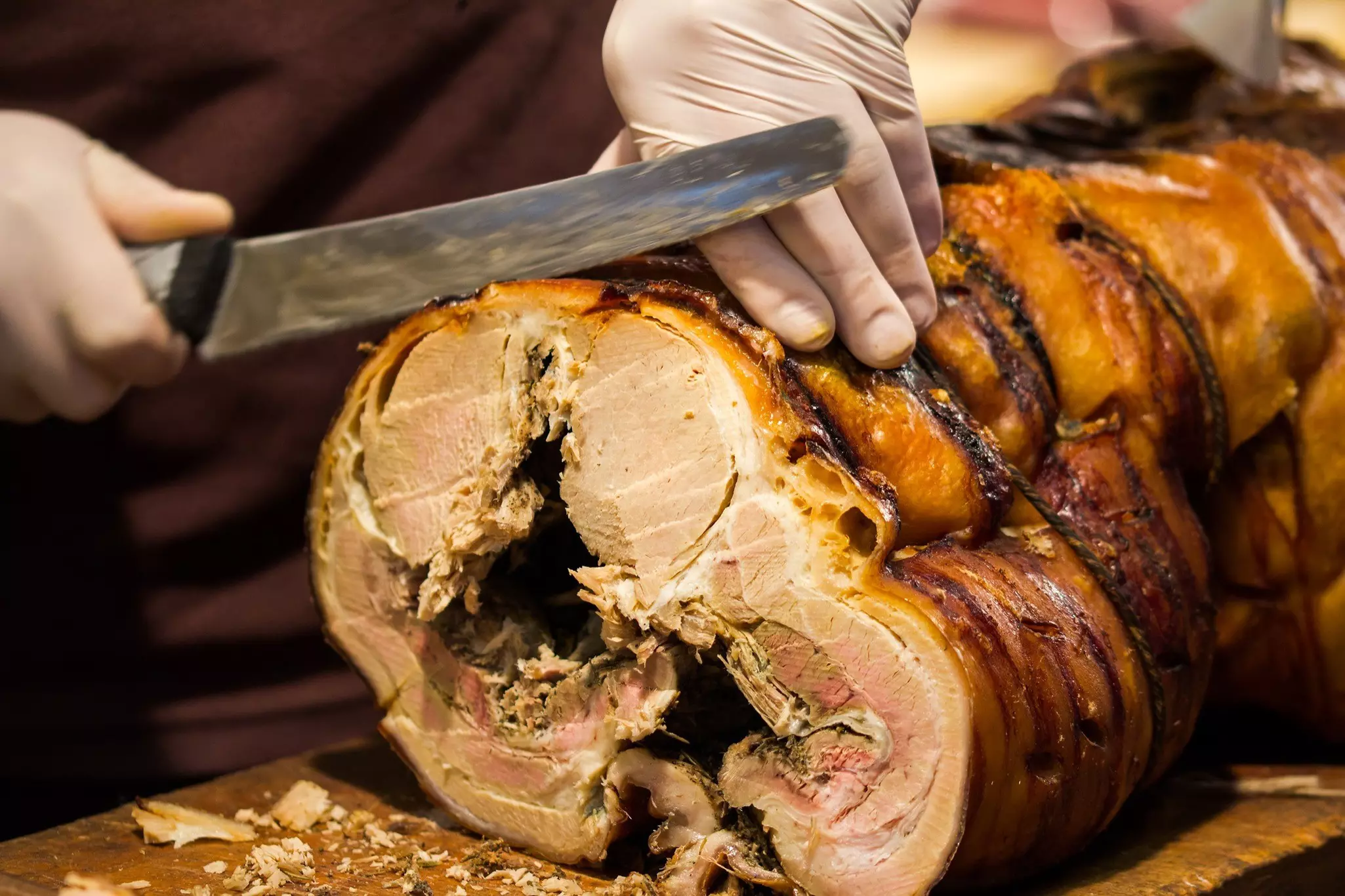 Porchetta is a savory, fatty, and moist boneless pork roast of Italian culinary tradition. For centuries the city’s norcini, or pork butchers, have been producing top-quality cured meats, salumi, and sausages © Getty Images