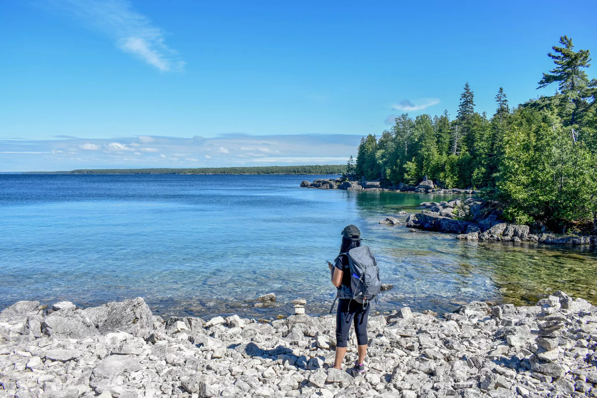 Unknown woman hiking in Bruce peninsula national park on a trail