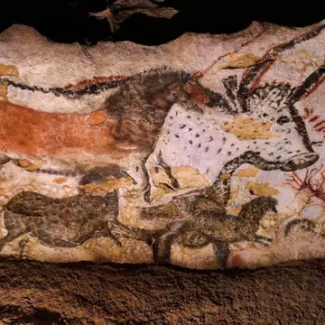 Reconstruction of cave paintings of animals inside Lascaux II.
