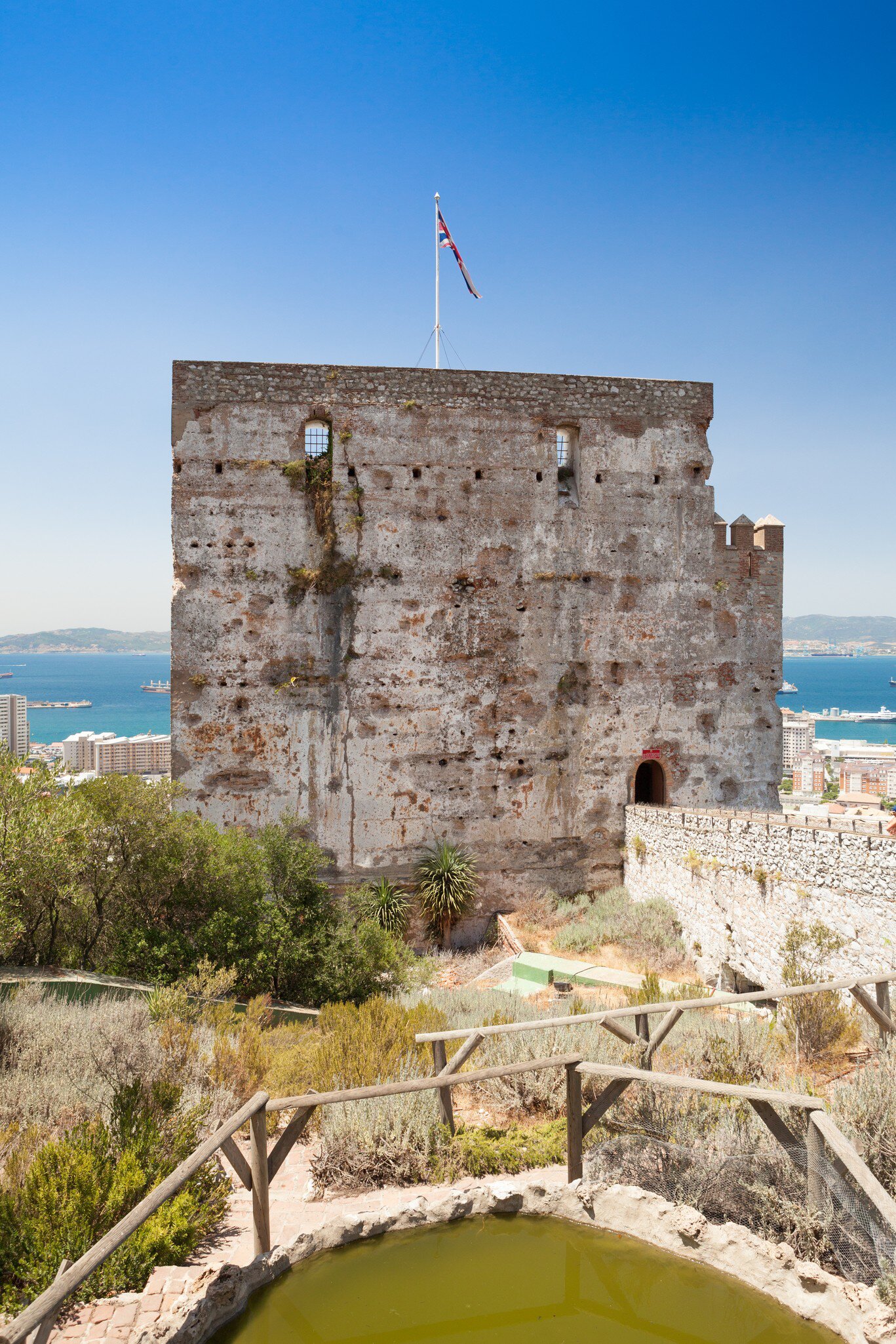The tower of the Moorish Castle in Gibraltar, with views to the sea in the background.