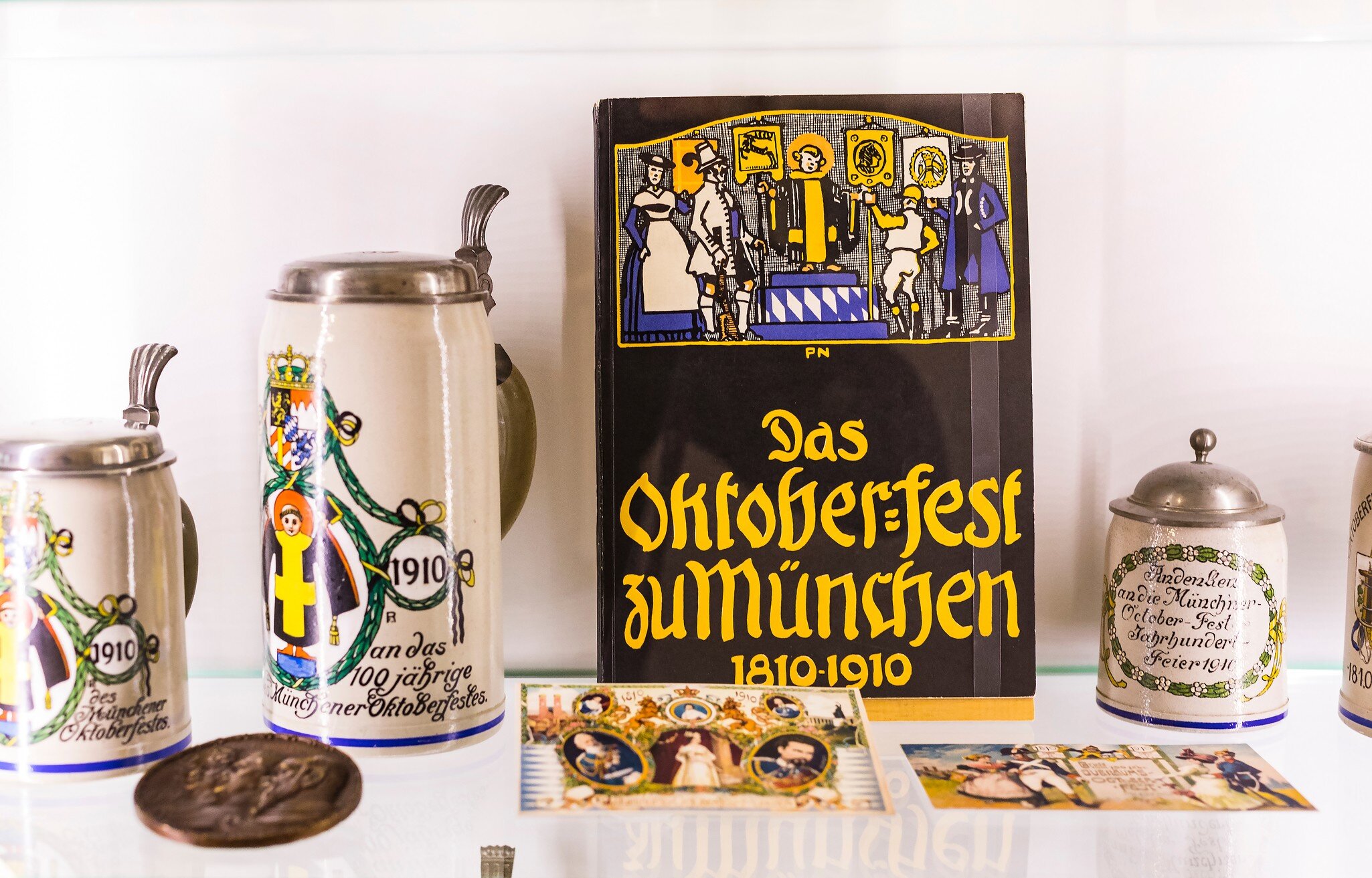 Mugs from Oktoberfest past are on display at the Museum of Bier & Oktoberfest in Munich, Germany.