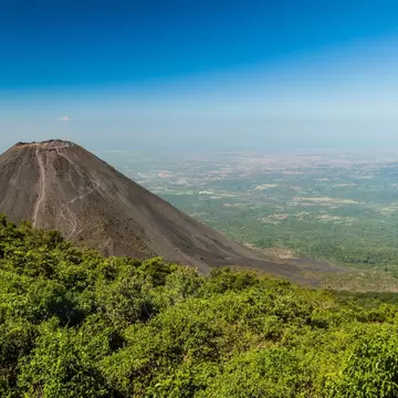 View of the Izalco volcano and surrounding landscape in El Salvador.