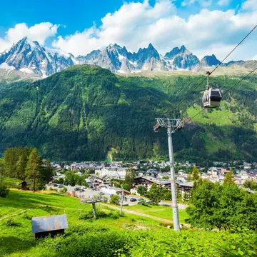 A cable car route over a small mountain town