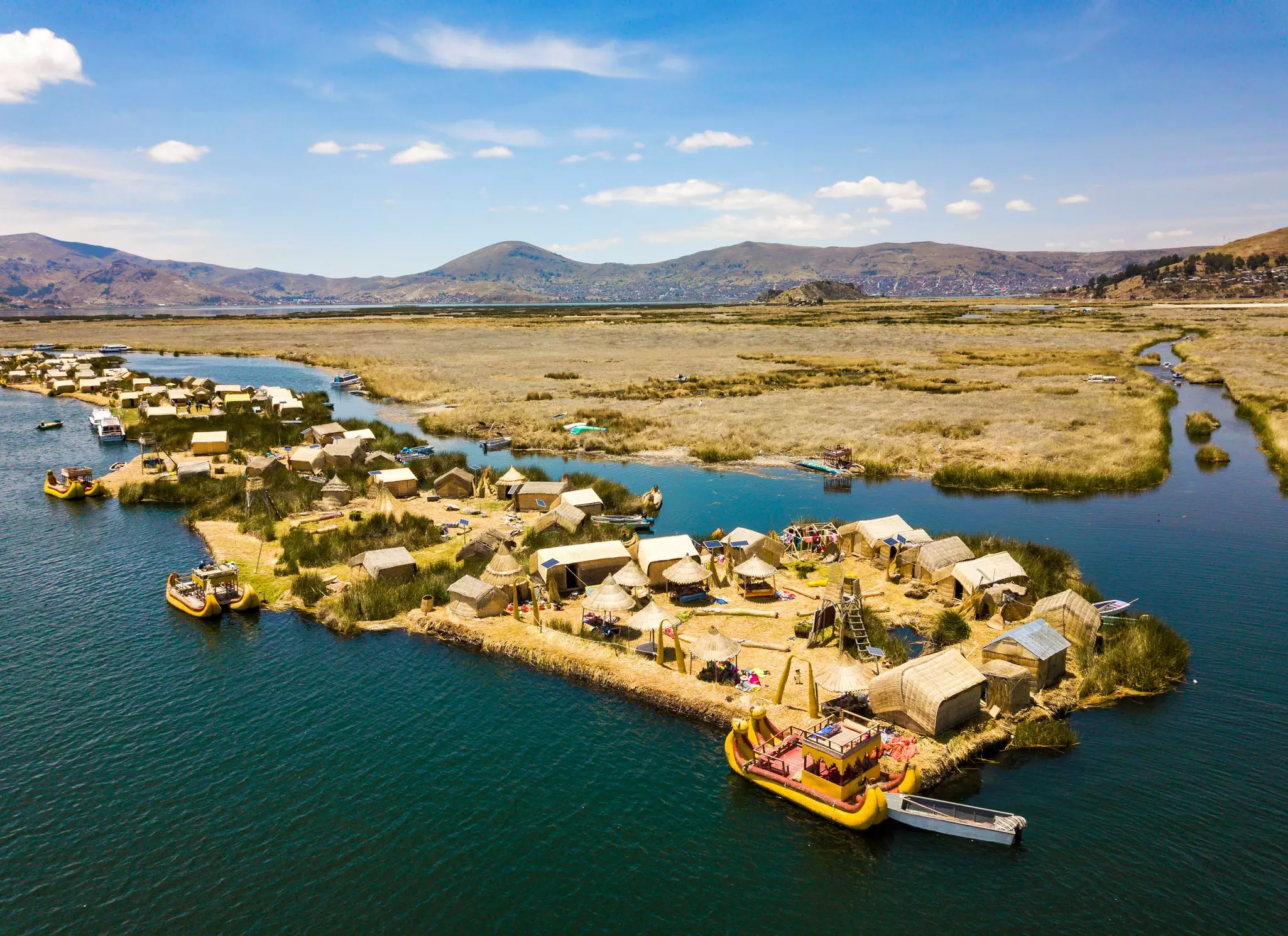 The floating islands of the Uros people on Lake Titicaca, Peru. 