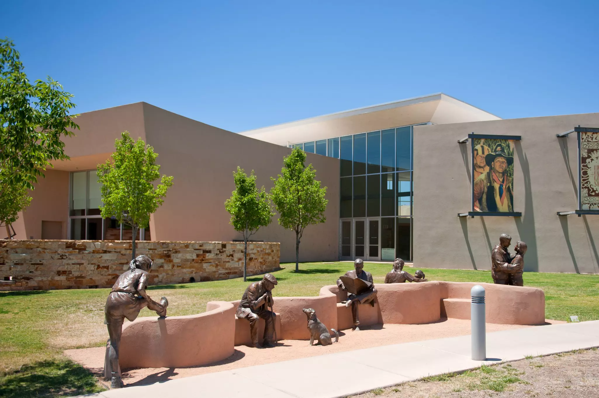 Exterior of Albuquerque Museum with sculptures of people