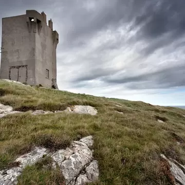 Malin Head is located on the Inishowen Peninsula, County Donegal, Ireland and is the most northerly point of the island of Ireland. A military watchtower was built at Banba's Crown in 1805, during the Napoleonic Wars. Around 1902, a signal station...