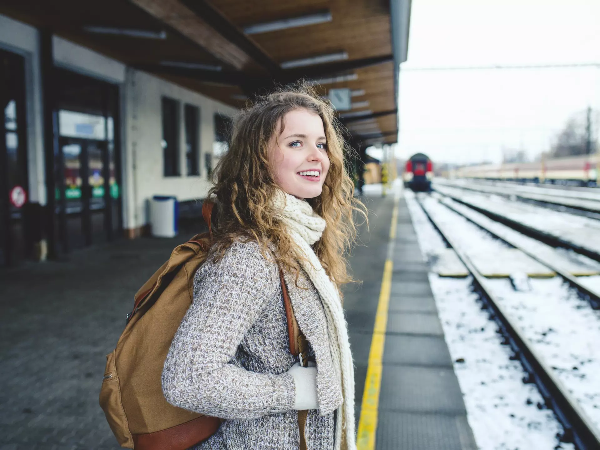 Smiling teenage girl on a train station platform during winter.
634469117
Happiness, Portrait, Train Journey, Contented Emotion, Joy, Focus On Foreground, Winter, Passenger, Backpack, 16-17 Years, Warm Clothing, Platform, Blond Hair, rail journey, One Person, Railroad Station, Day, Train, Traffic, Travel, Anticipation, Waiting, Casual Clothing, Long Hair, Transportation, People, Rail Transportation, Mode of Transport, Teenagers Only, Liptovsky Mikulas, Caucasian Ethnicity, Slovakia, Horizontal, Train - Vehicle, Color Image, Railroad Station Platform, Outdoors, Smiling, Teenage Girls, Station, One Teenage Girl Only, Teenager, Photography, Waist Up