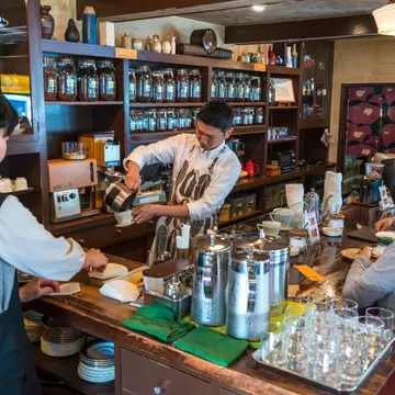 Coffee shop. Kanazawa. Japan. (Photo by: Peter Adams/Avalon/Universal Images Group via Getty Images)
1277719321
artwork, asian, coffee, counter, decor, dish, glass, grinder, indoor, interior, japanese, pour over, server, serving, shop, traditional, wall