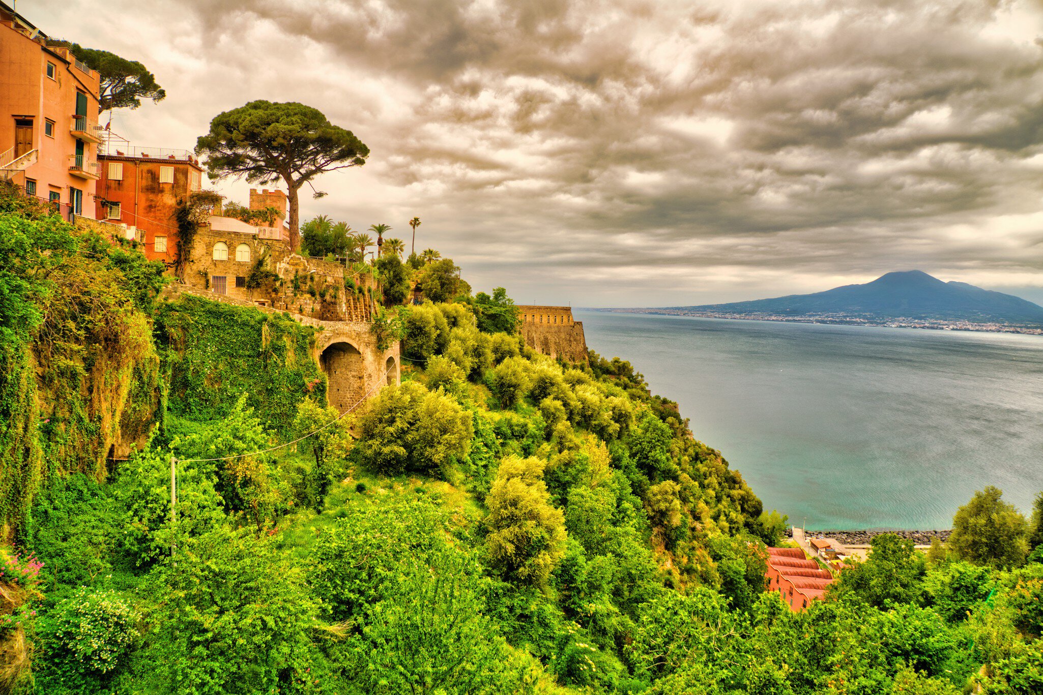 Looking from the small village of Vico Equense towards Mount Vesuvius over the bay of Naples. The eruption of Mount Vesuvius in AD 79 destroyed the Roman cities of Pompeii, Herculaneum as well as several other settlements. until today the Vulcano ist still active.