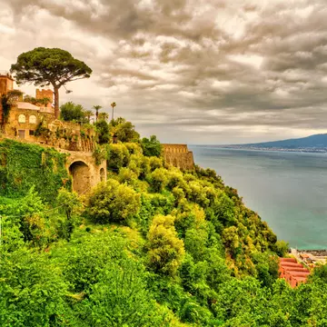 Looking from the small village of Vico Equense towards Mount Vesuvius over the bay of Naples. The eruption of Mount Vesuvius in AD 79 destroyed the Roman cities of Pompeii, Herculaneum as well as several other settlements. until today the Vulcano ist still active.