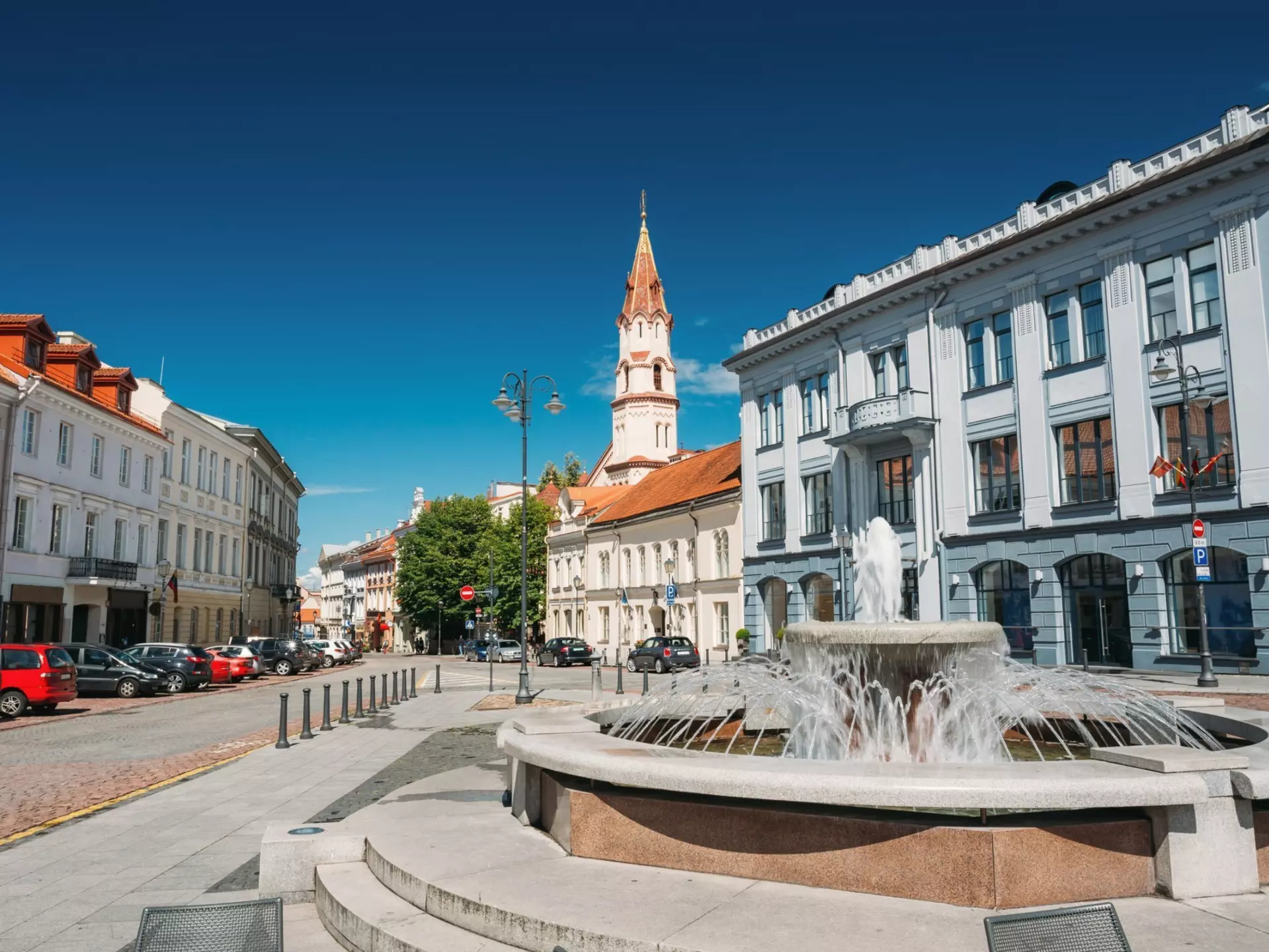 St. Nicholas Church and the fountain in Rotuses Square In Old Town. Vilnius.