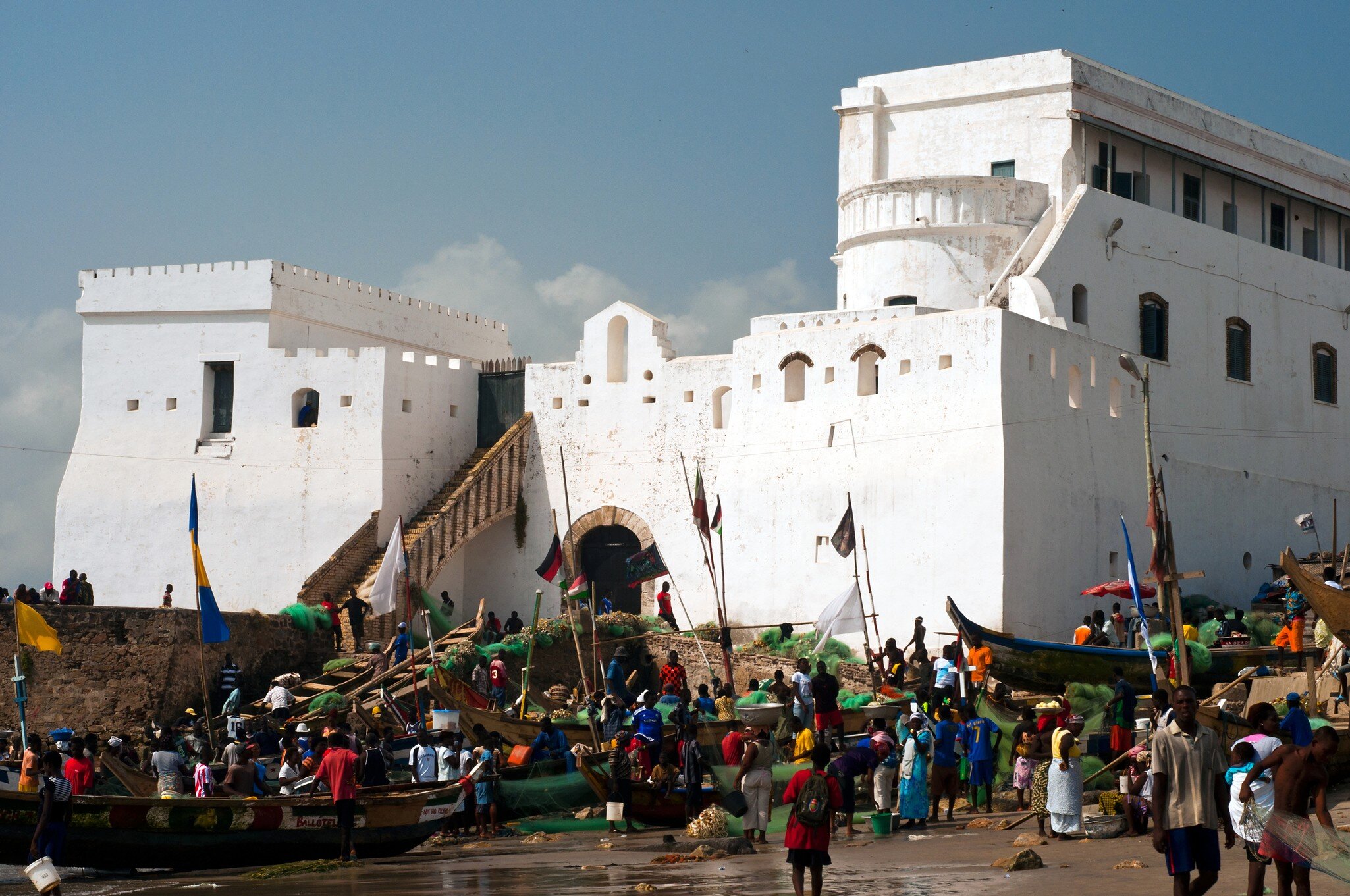 Fishing boats and Cape Coast castle