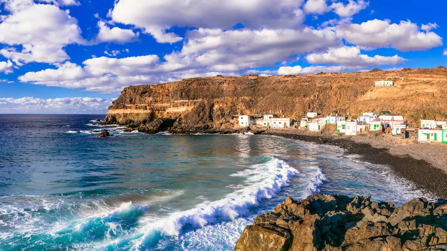 Waves rolling onto the beach near the fishing village of Puertito de Molinos, Fuerteventura