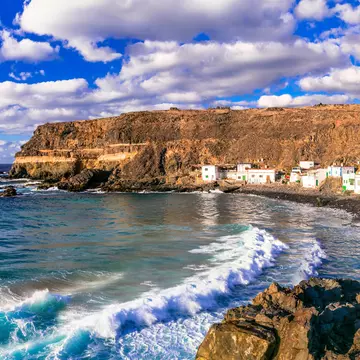 Waves rolling onto the beach near the fishing village of Puertito de Molinos, Fuerteventura