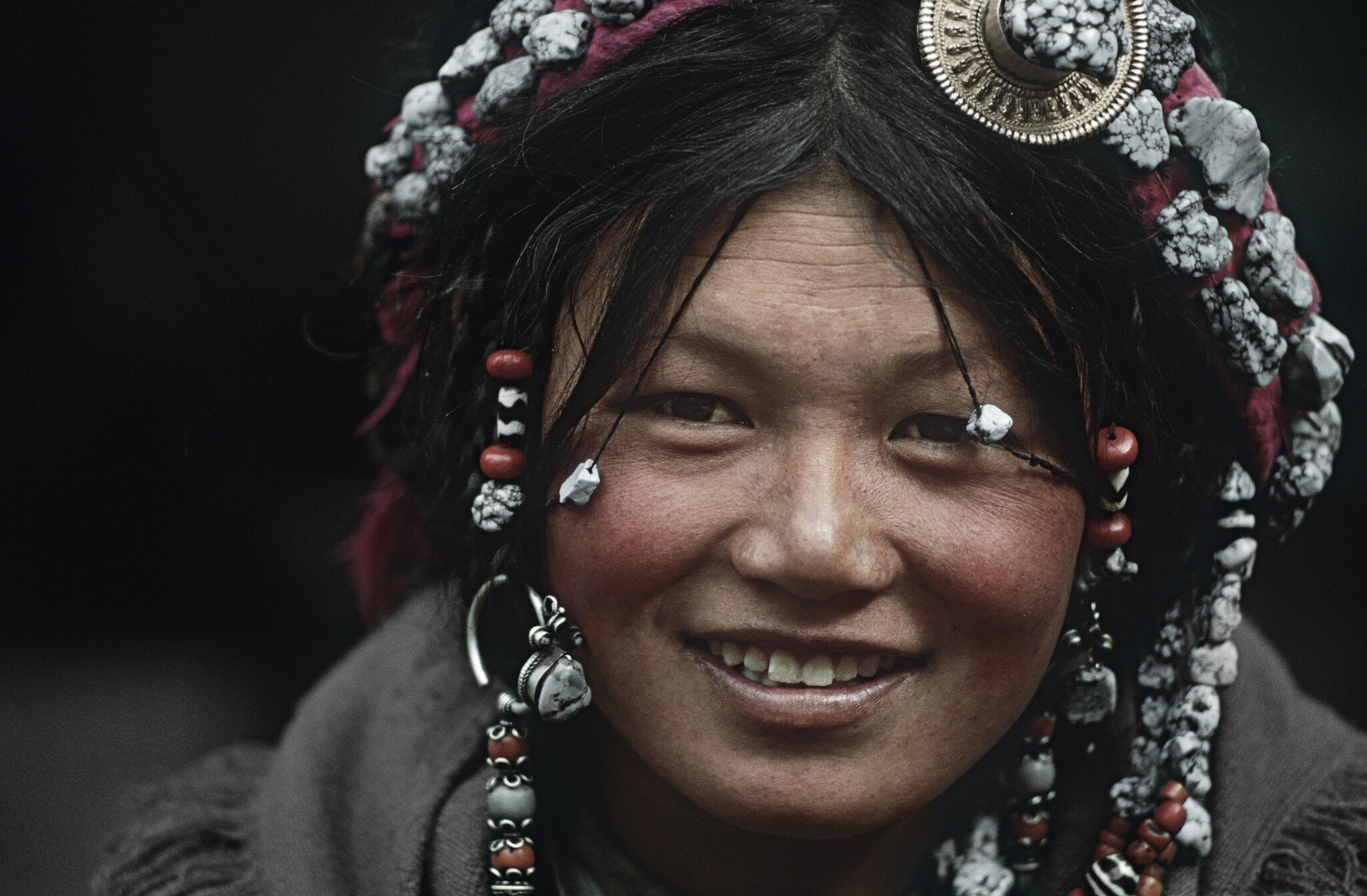 Young Tibetan Woman Wearing Traditional Hair Accessories