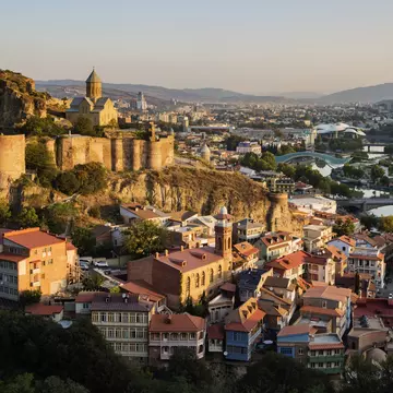 A photograph of the Tbilisi Architecture Map, with text and photographs of buildings