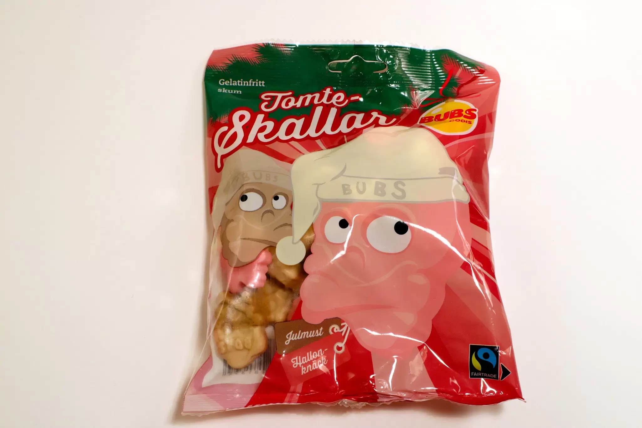 Stockholm, Sweden. December 08, 2020. Close up on a package of Swedish candy called tomteskallar. Taste great. Isolated on a white background., License Type: media, Download Time: 2024-10-21T18:40:01.000Z, User: alimuff, Editorial: true, purchase_order: 56500 - T&R or Kids, job: Lonely Planet Kids, client: Snacks Around the World, other: Alison O'Brien Muff