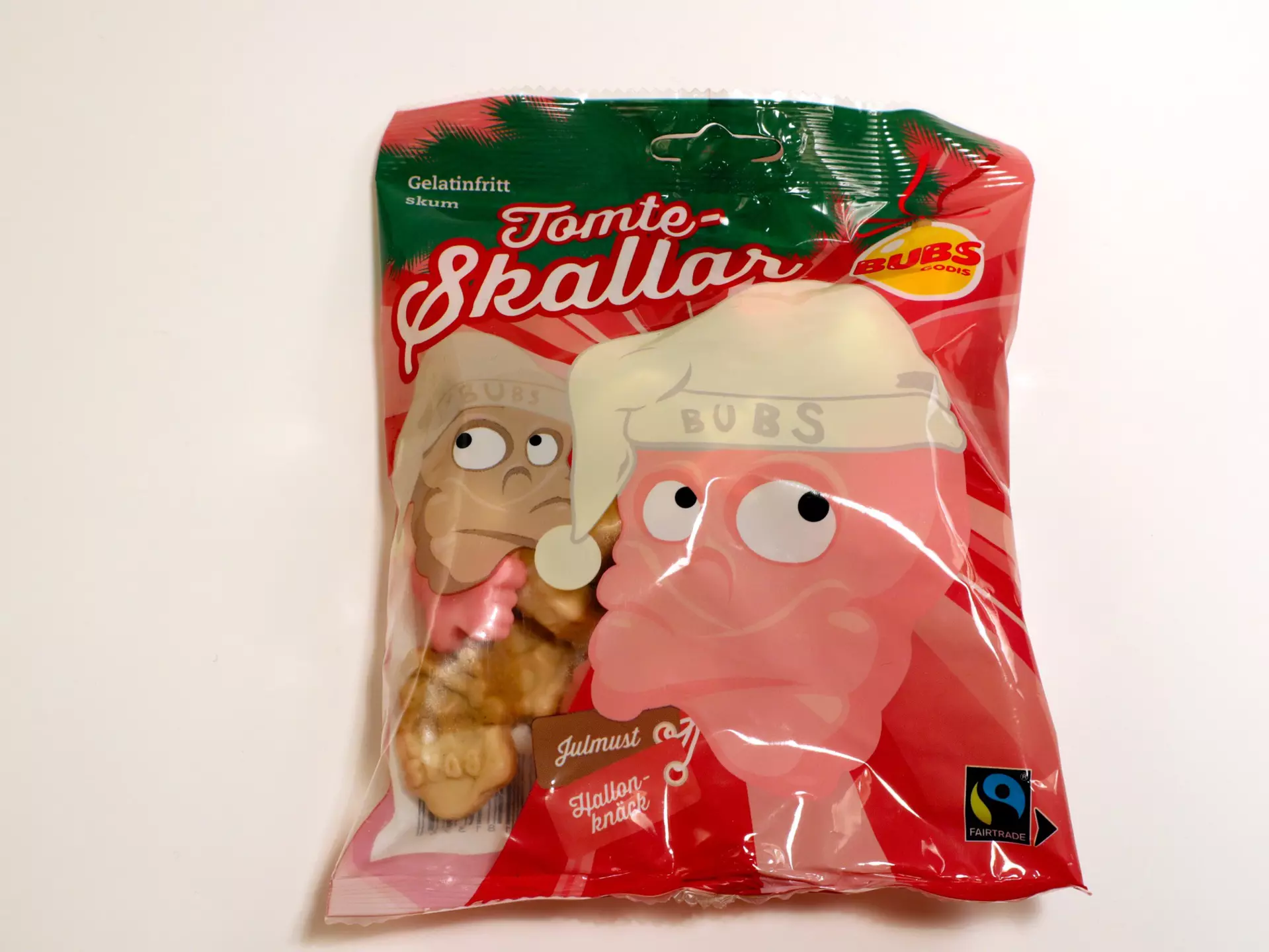 Stockholm, Sweden. December 08, 2020. Close up on a package of Swedish candy called tomteskallar. Taste great. Isolated on a white background., License Type: media, Download Time: 2024-10-21T18:40:01.000Z, User: alimuff, Editorial: true, purchase_order: 56500 - T&R or Kids, job: Lonely Planet Kids, client: Snacks Around the World, other: Alison O'Brien Muff