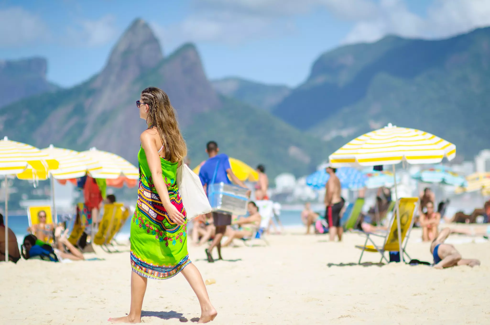 RIO DE JANEIRO - FEBRUARY 11, 2017: Beachgoers enjoy a hot summer afternoon on Ipanema Beach.