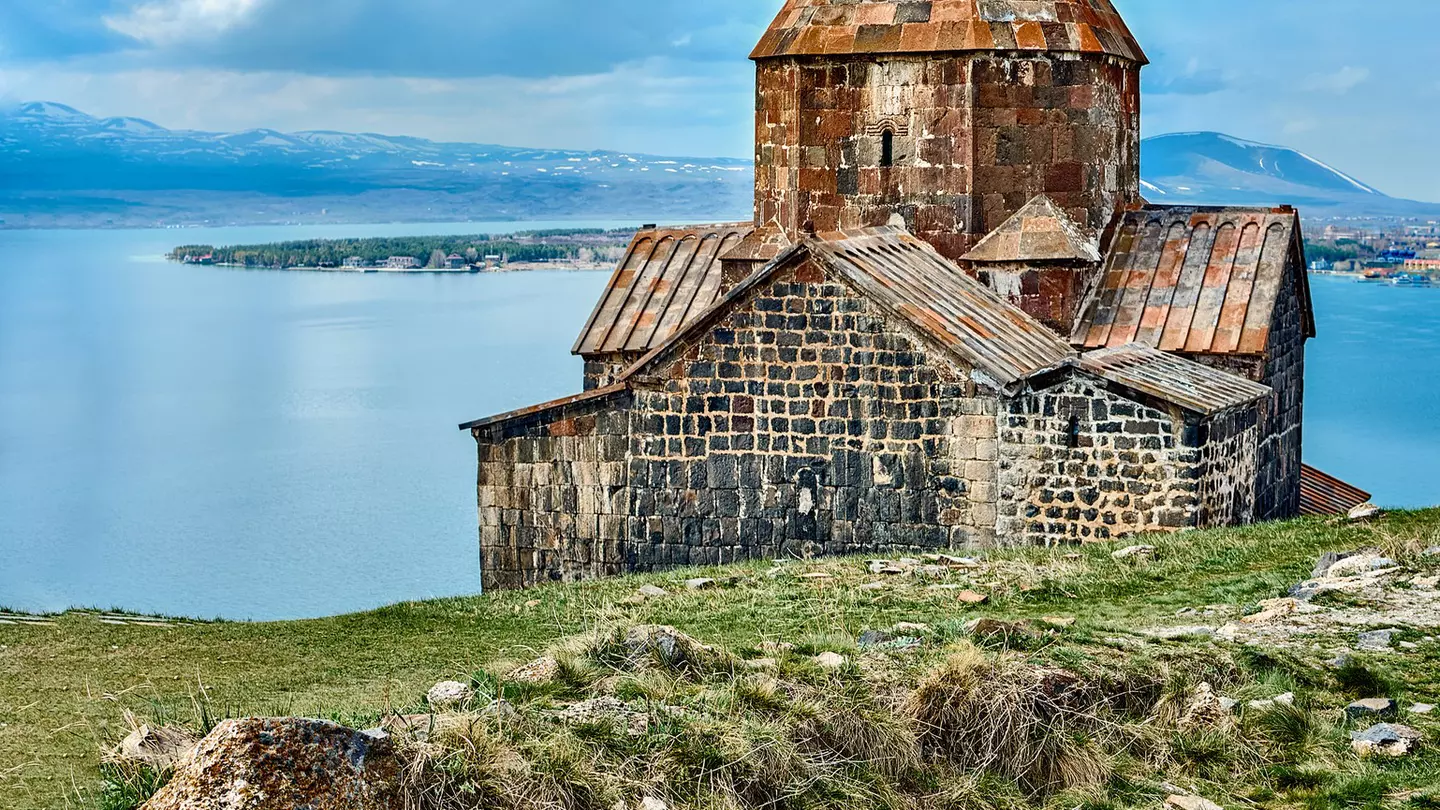 A stone fortress surrounded by water.