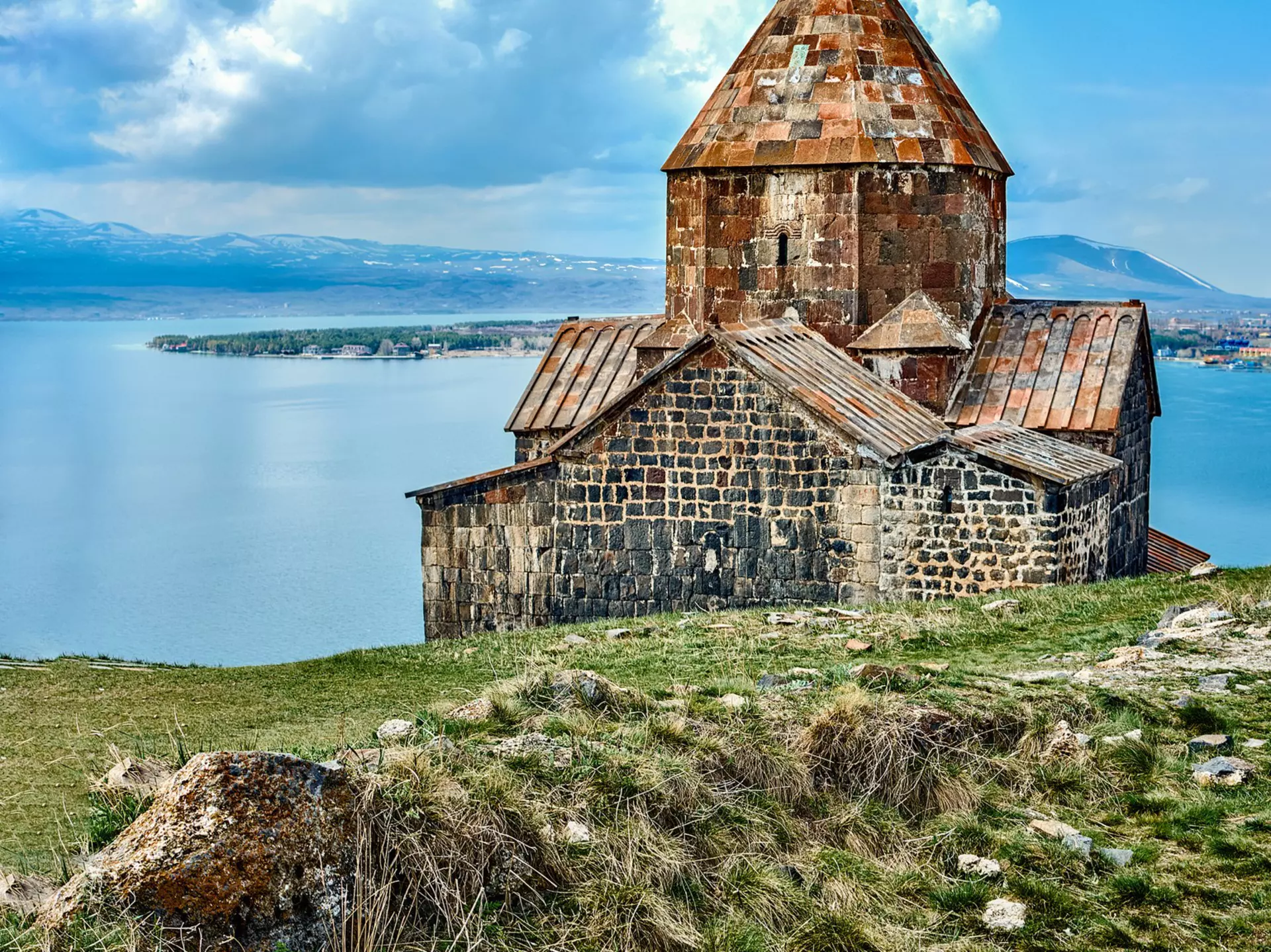 A stone fortress surrounded by water.