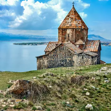A stone fortress surrounded by water.