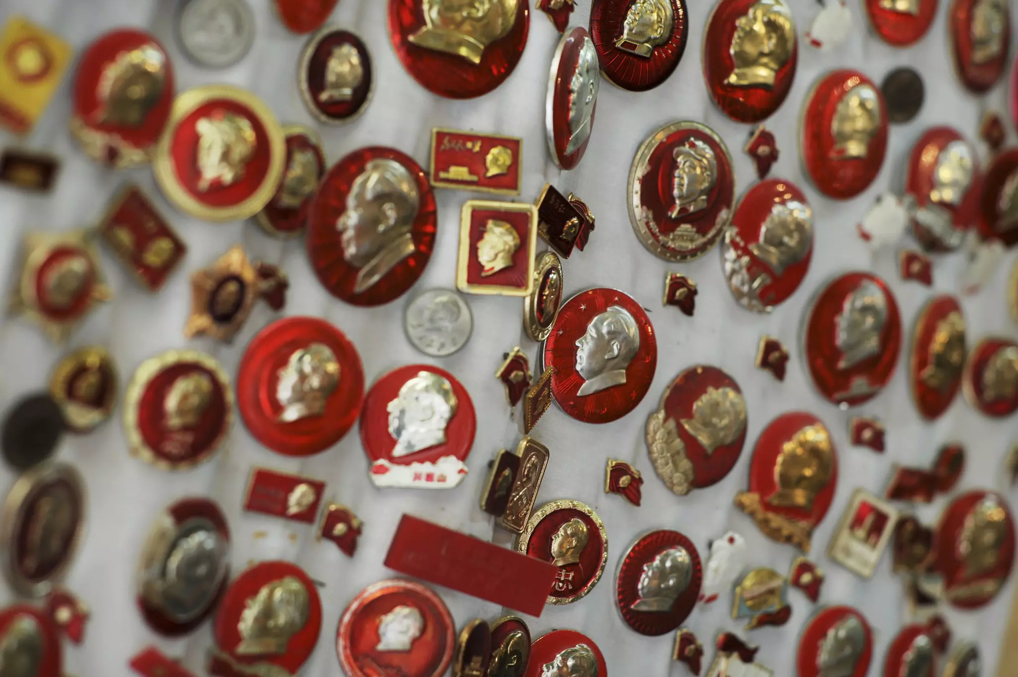 Cultural Revolution badges for sale at Cat Street market