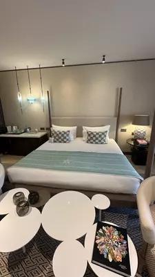 A hotel room with sleek furnishings