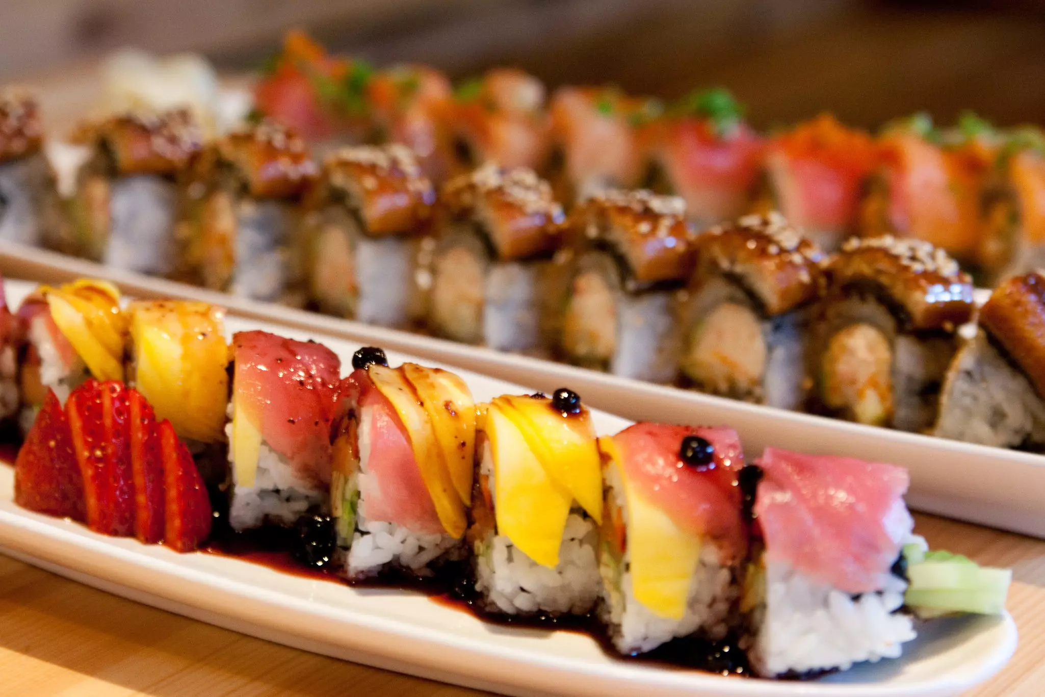 Close up of delicious sushi rolls on trays in Belltown