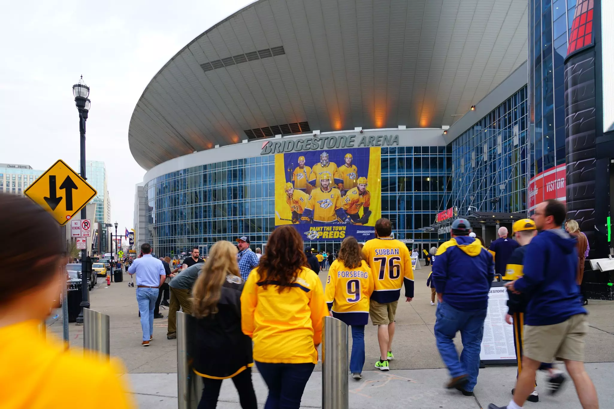 Sports fans arriving at the the Bridgestone Arena, a multipurpose venue home of the NHL Nashville Predators located in downtown Nashville, Tennessee