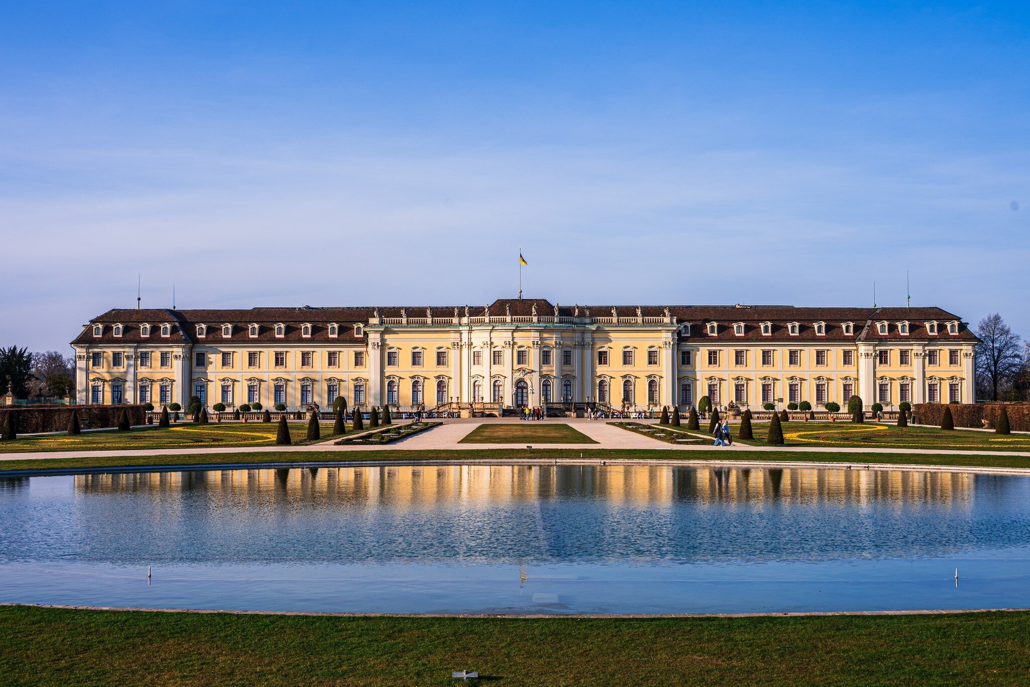 Facade of the baroque castle in Ludwigsburg with public garden and park in Germany.