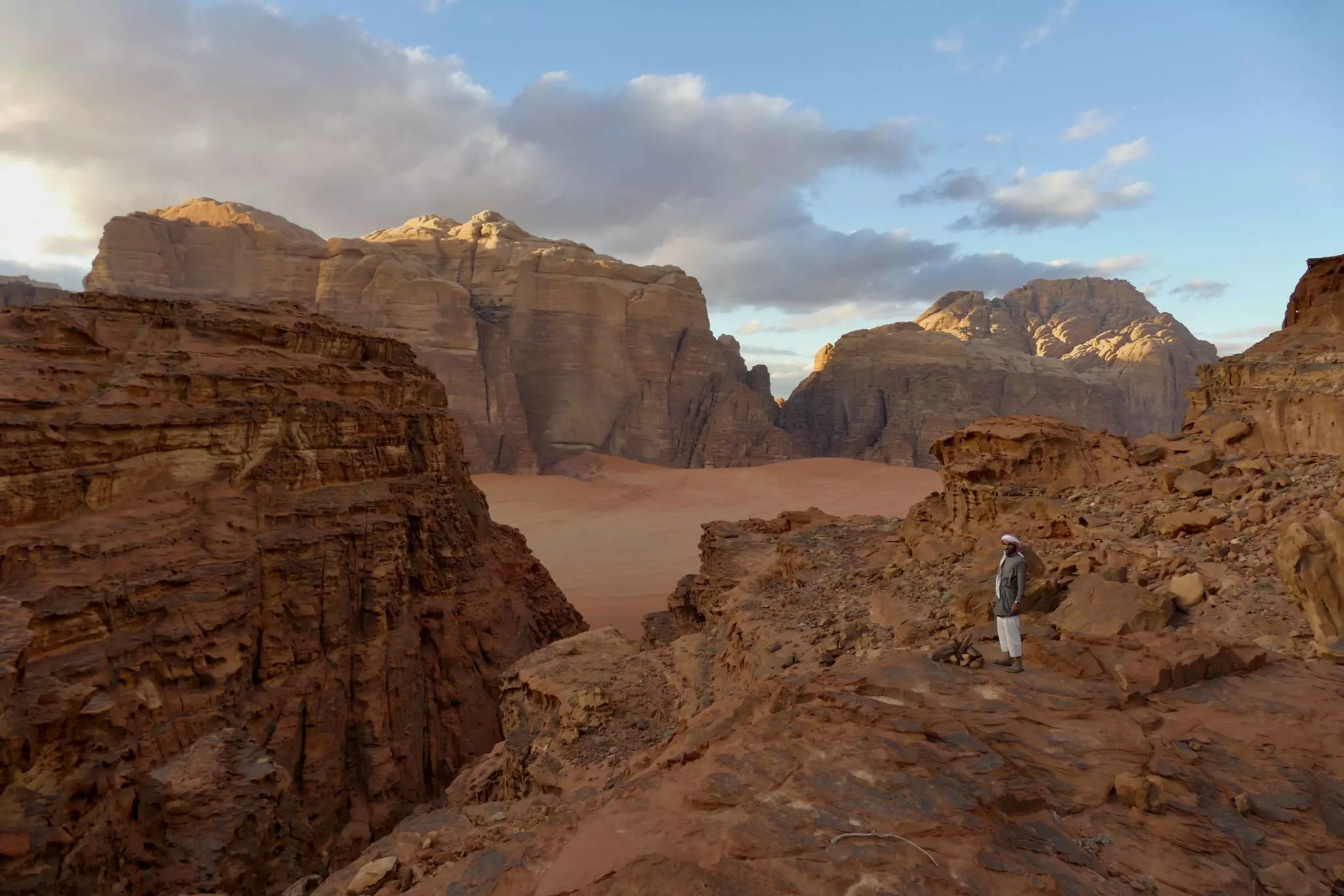 Your Bedouin guide will help you scramble up to lesser-known areas of Wadi Rum, such as Jebel Um Ghatheeya  © courtesy Wadi Rum Trail