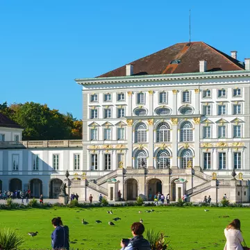Visitors on the lawn in front of the Nymphenburg Palace, Munich
