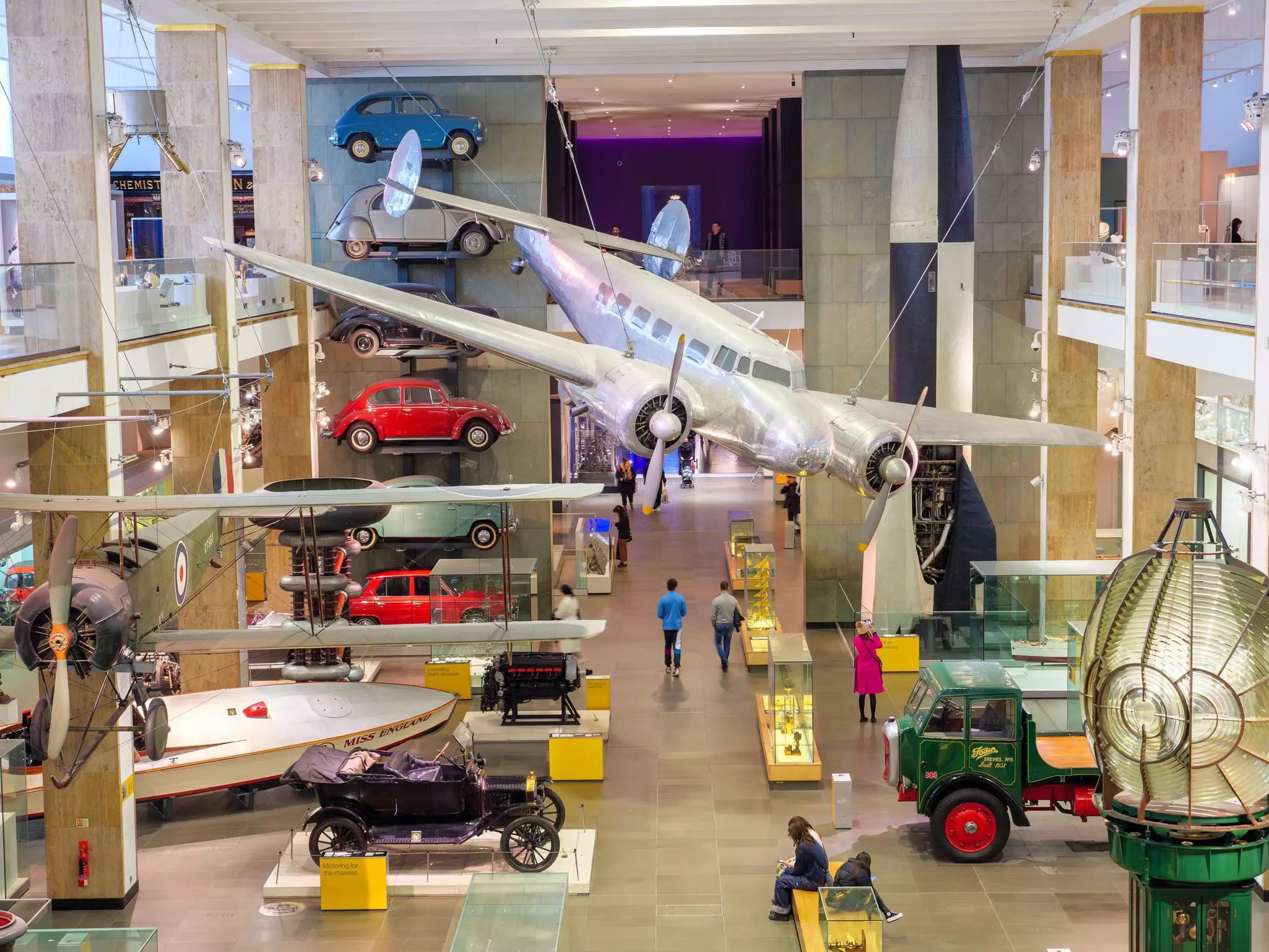 Historic vehicles exhibited inside the Science Museum, London, England.