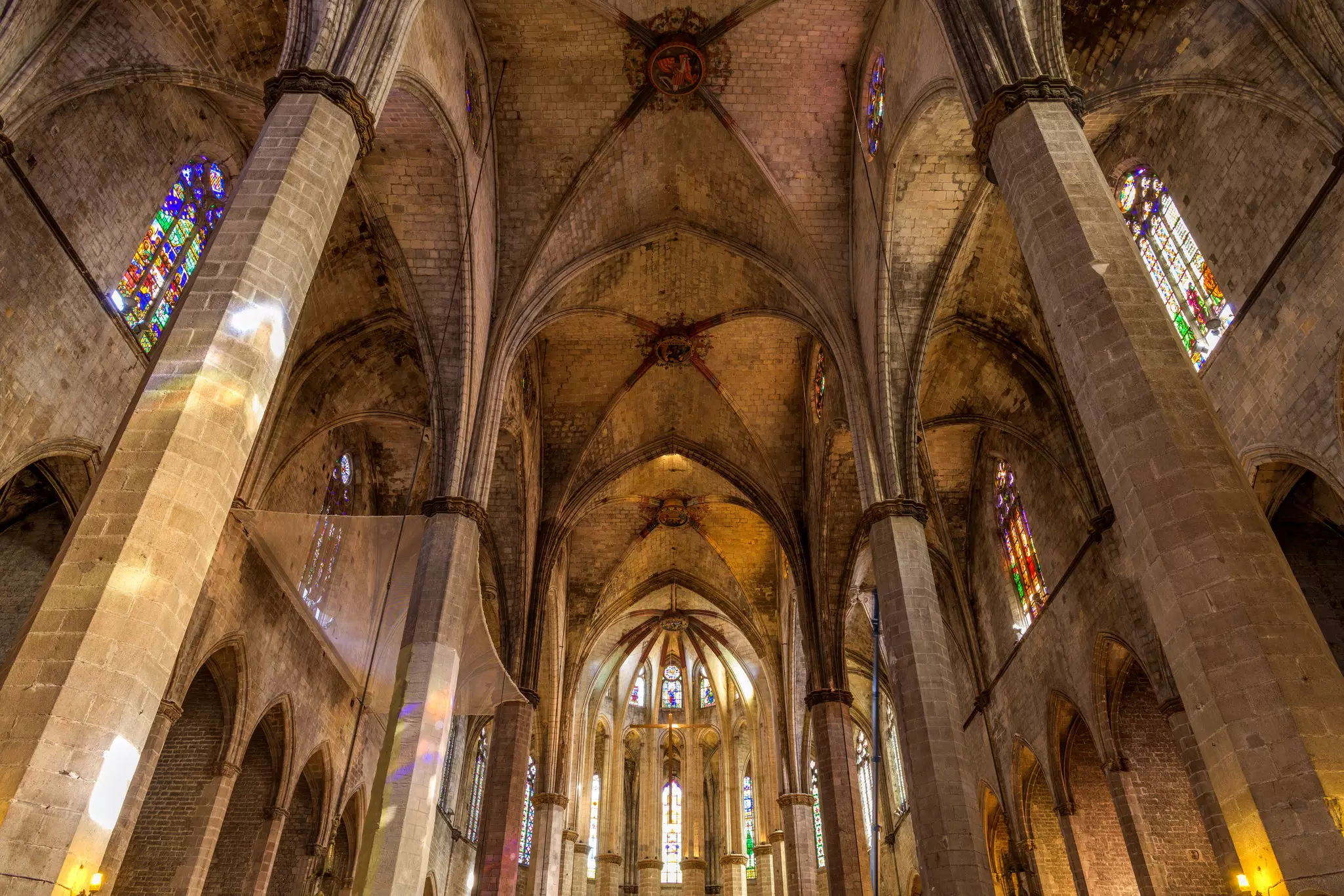 Gothic arches inside a church in Barcelona, Spain.