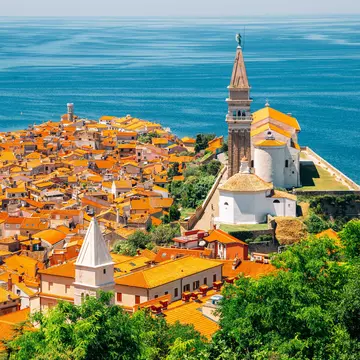Panoramic view of Piran old town and Adriatic sea with St. George's Parish Church in Slovenia, License Type: media, Download Time: 2025-08-22T20:47:38.000Z, User: dorota_littlerobindesign, Editorial: false, purchase_order: 56530 - Guidebooks, job: Global Publishing WIP, client: Slovenia 12, other: Dorota Michalec