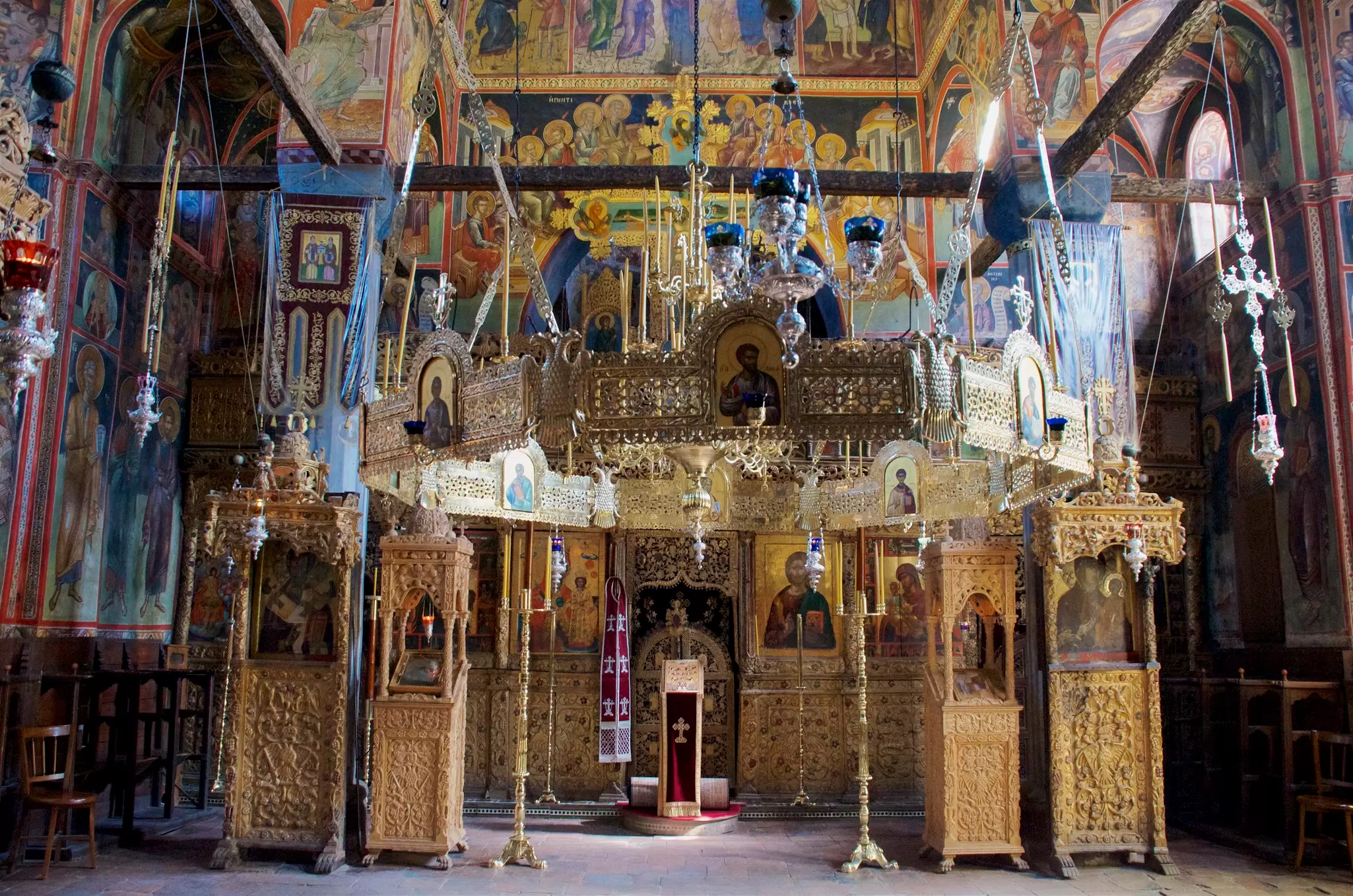 Interior view of the colorful chapel inside the Great Meteoron Monastery in Meteora, Greece.