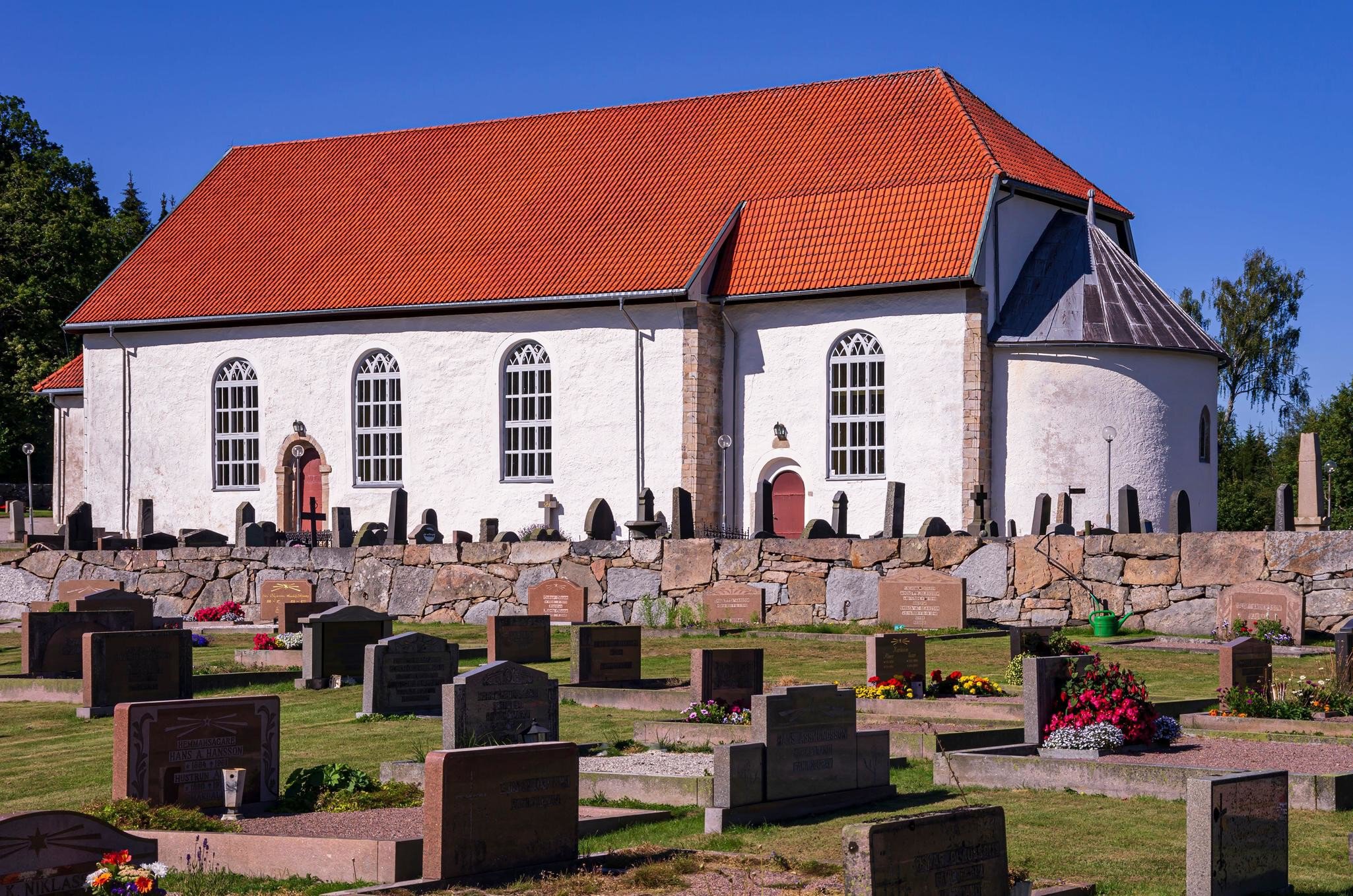 2YWJ1YA Picturesque view of Skee kyrka, a 12th century church and cemetery in the village of Skee, near Stromstad in Bohuslan, Vastra Gotalands lan, Sweden.
2YWJ1YA
churchyard, church, scenery, village, landmark, architecture, culture, Scandinavia, Stromstad, Sweden, Skee, Bohuslan, Vastra, Gotalands, lan, Knutimage, cemetery, sacred, building, village, church, place, of, worship, religion, Christianity, faith, superstition, building, monument, sight, country, picturesque, peaceful, summer, travel, tourism, tombs, burial, site, Northern, Europe, Nordic, structure, cultural, heritage, mystical, parish, medieval, gothic, 12th, century, century, romanesque, listed, edifice, sightseeing
**RIGHTS RESERVED** Uploaded for use on the LP app

Picturesque view of Skee kyrka, a 12th century church and cemetery in the village of Skee, near Strömstad in Bohuslän, Västra Götalands län, Sweden.