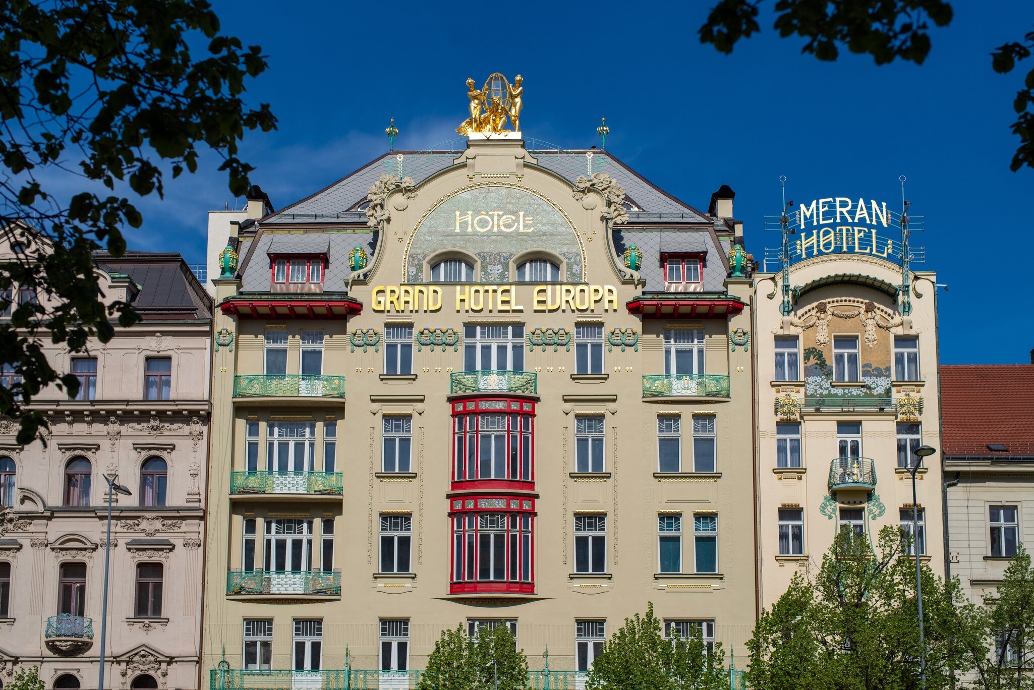 Beautiful historical building of Grand Hotel Evropa and Meran Hotel in Prague city centre on a sunny spring day. Prague, Czech Republic. 