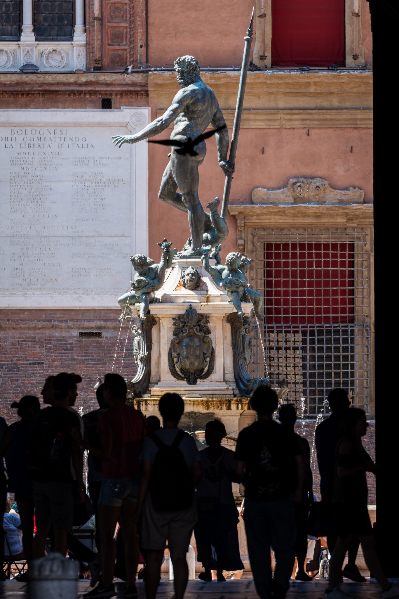 The iconic Fountain of Neptune in the Piazza Maggiore.