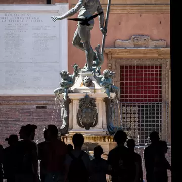 The iconic Fountain of Neptune in the Piazza Maggiore.