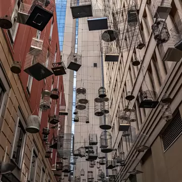 Hanging  birdcages in Angel place, where "forgotten songs" play the sounds of the birds which once inhabited Sydney, Australia.