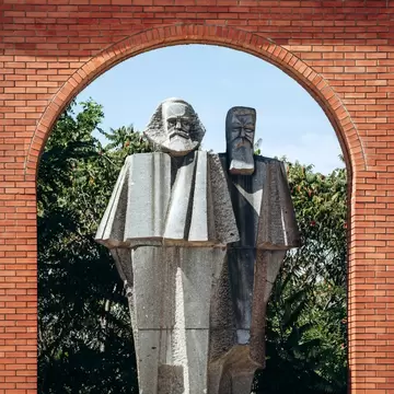 Statues of Karl Marx and Friedrich Engels in Memento Park in Budapest, Hungary.
