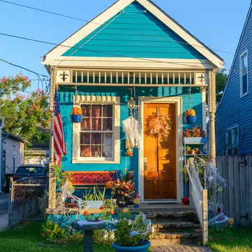 Blue cottage decorated for Halloween in New Orleans.