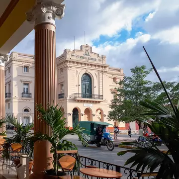 Santa Clara, Villa Clara, Cuba-January 21, 2020: The Charity Theater, a Cuban National Monument, seen from the porch of a colonial building in the city center