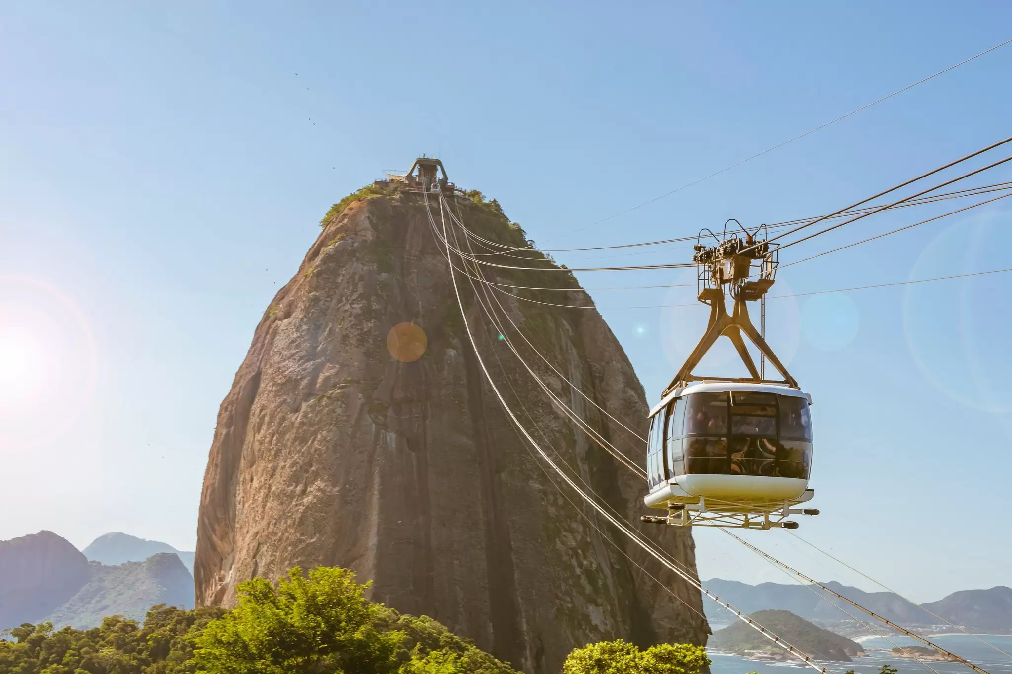 View of the cable car crossing from Sugarloaf Mountain to Urca Hill in Rio de Janeiro, Brazil.