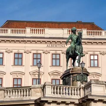Austria, Vienna, Albrechtsplatz: Front view of world famous Albertina museum palais palace with Albrecht statue in the city center of the Austrian capital with blue sky - concept travel history art; Shutterstock ID 1338388385;